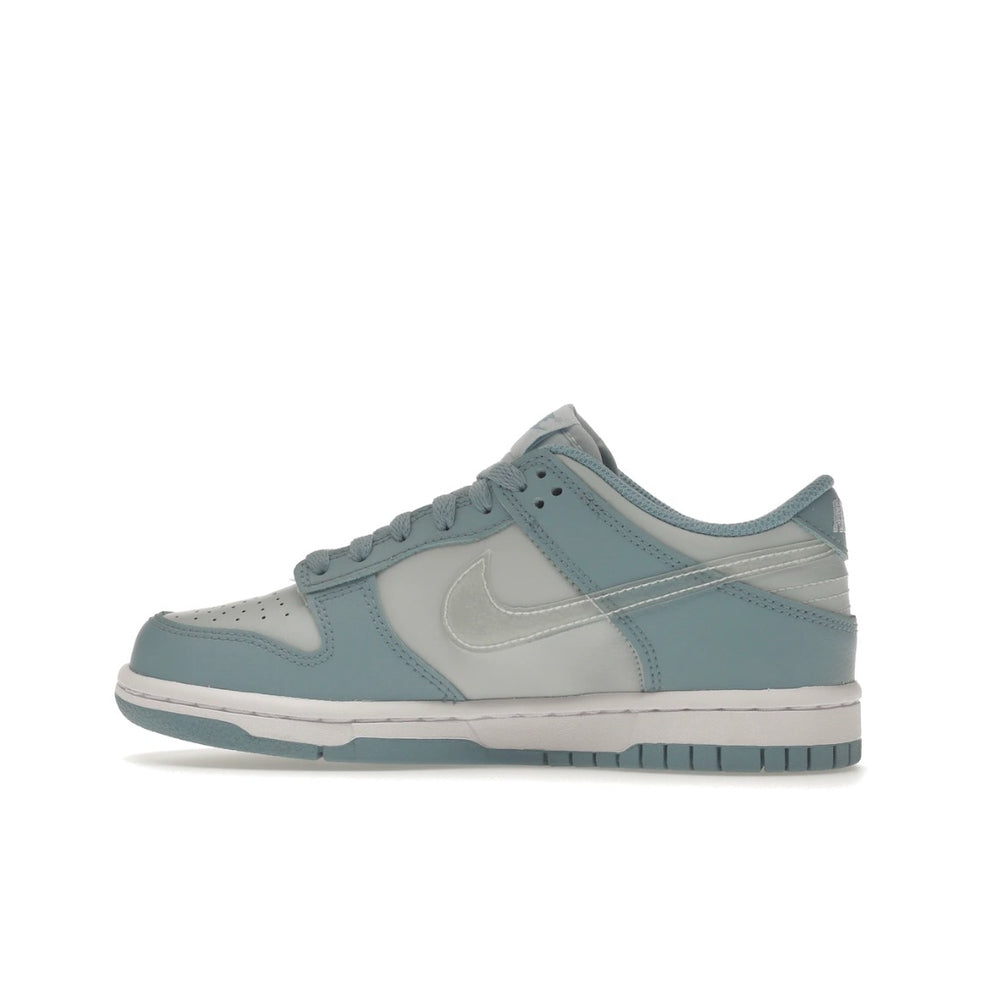 
                      
                        Nike dunk low clear blue swoosh (GS)
                      
                    